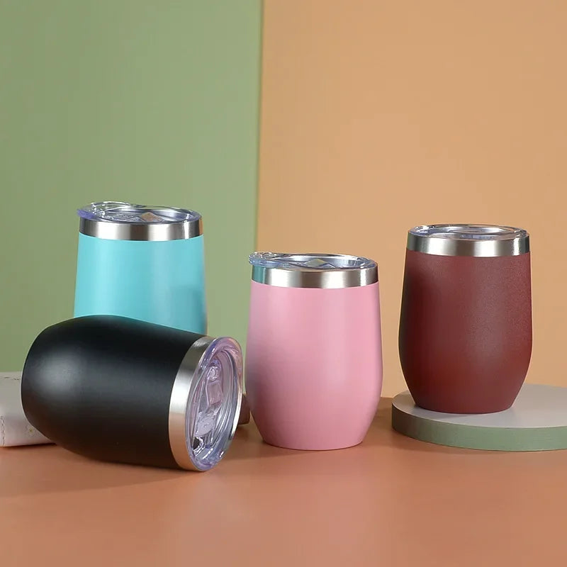 Set of four 12oz insulated stainless wine tumblers with lids