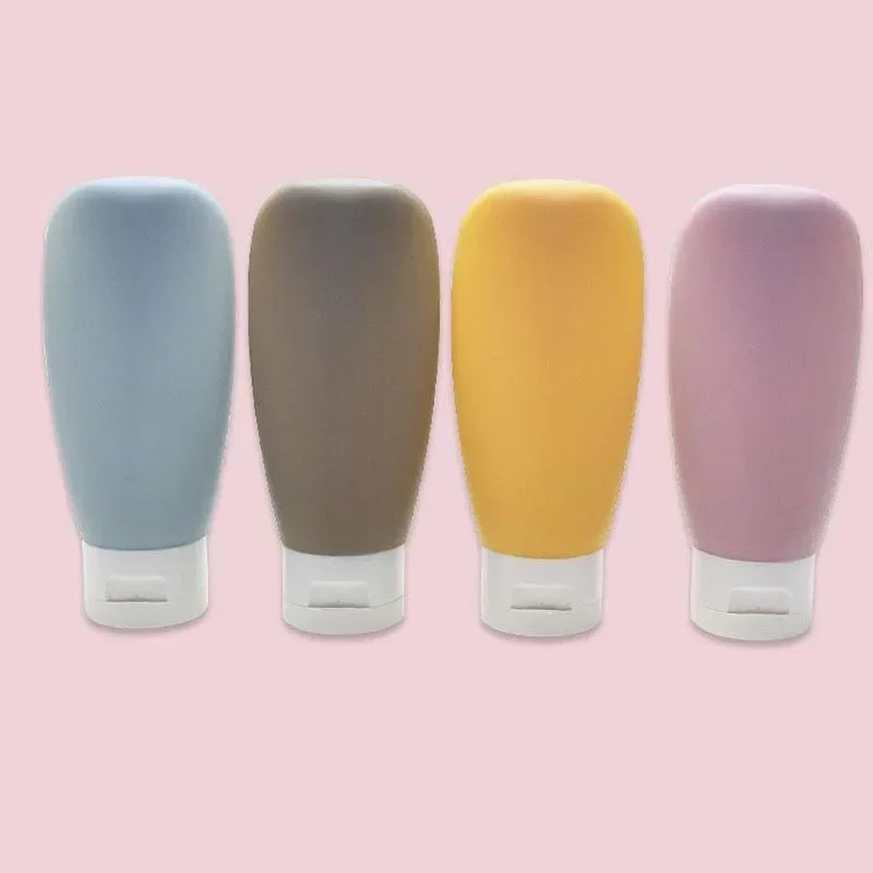 Refillable Travel Bottles Set — 4× 60ml Squeeze Tubes for Lotion & Toiletries