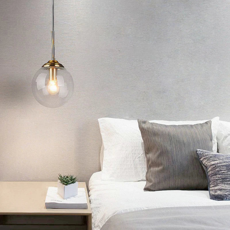 Modern Glass Globe Pendant Light with Brass Accents