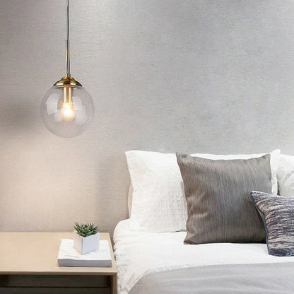 Modern Glass Globe Pendant Light with Brass Accents