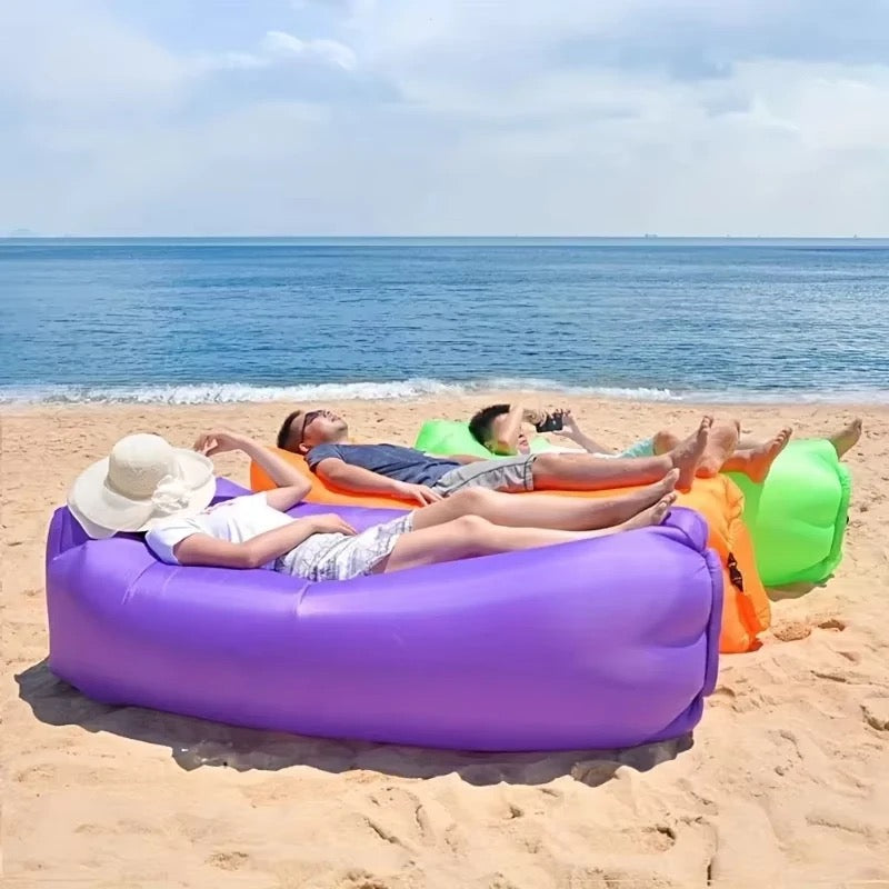 Inflatable air lounger in use — real product photo