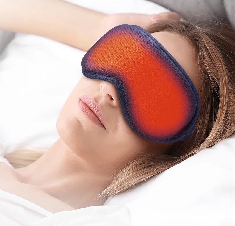 Heated steam eye mask in use — real product photo