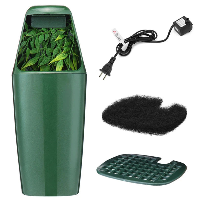 Reptile drinking fountain with submersible pump, carbon filter pad and base — what's included